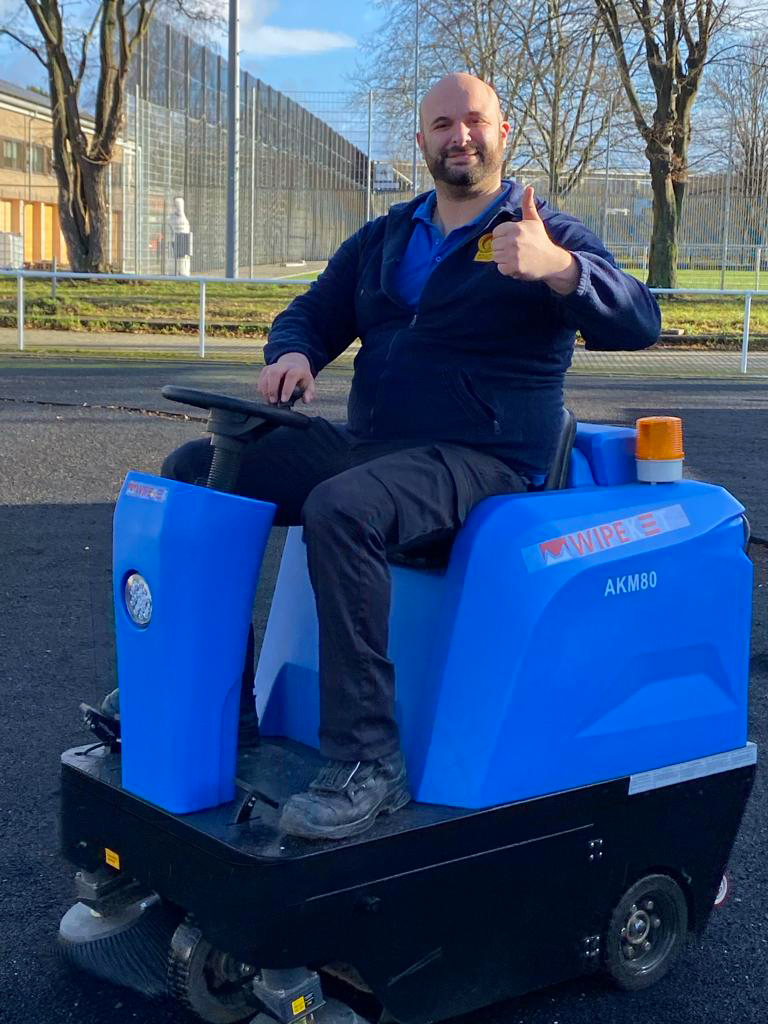 Use of the AKM80 ride-on sweeper